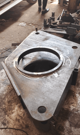 Precision laser cut steel plate with circular hole